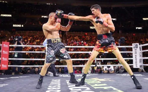 Цзю сенсационно уступил в кровавой бойне. Тим лишился чемпионского пояса