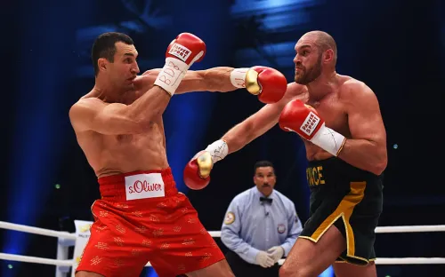Фьюри разбил украинского чемпиона. Кличко забрал решающий раунд, но потерял всё